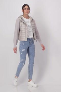 Quilted jacket with knitted sleeves